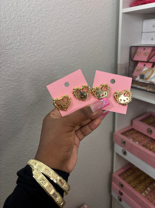 HK HEART TWIST STUDS