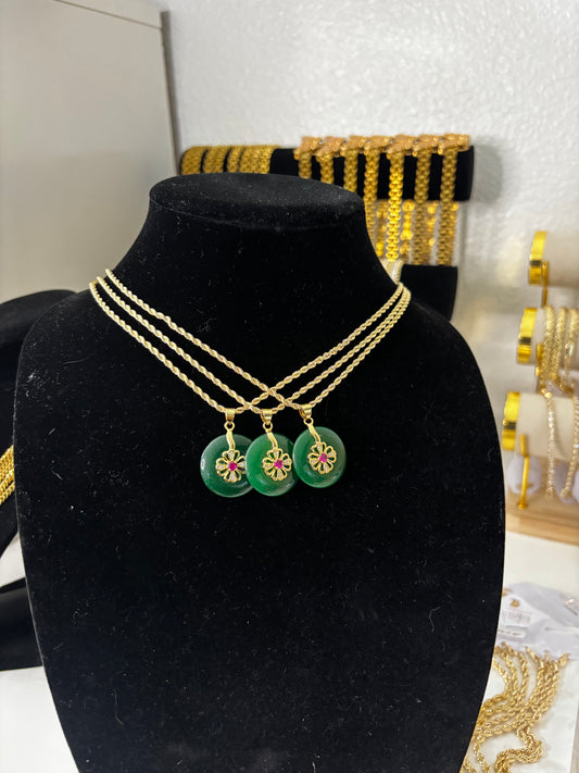 GREEN WHEEL OF FORTUNE NECKLACE